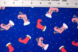 "Stockings" Christmas Fabric from Springs Creative- 1 yard 42" wide, Red & White Elf Stockings on Blue background 100% Cotton