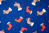 "Stockings" Christmas Fabric from Springs Creative- 1 yard 42" wide, Red & White Elf Stockings on Blue background 100% Cotton