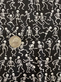 White Skeletons Dancing on Black Cotton Fabric:  Sold by FQ