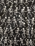 White Skeletons Dancing on Black Cotton Fabric:  Sold by FQ