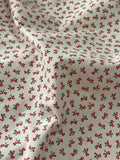 Tiny Tossed Candy Canes: Cotton Fabric, Sold as Fat Quarters