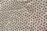 Tiny Tossed Candy Canes: Cotton Fabric, Sold as Fat Quarters