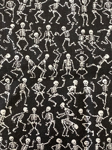 White Skeletons Dancing on Black Cotton Fabric:  Sold by FQ