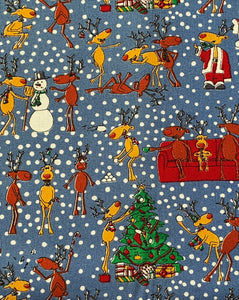 Reindeer at Play Cotton Fabric by Robert Kaufman: 42" wide, Sold by 1/2 yard