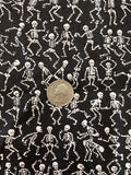 White Skeletons Dancing on Black Cotton Fabric:  Sold by FQ