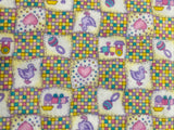 Pastel Flannel Fabric with Baby Toys Motif: sold by the FQ