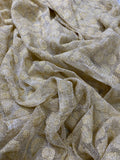 Gold Metallic Crocheted or Embroidered Medallions on a Cream Lace Stockinette Knit Fabric: Sold by the Yard, 56" wide