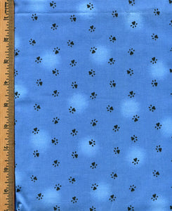 Black Cat Paw Prints on Blue Cotton  45" wide by 1 yard.