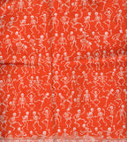 White Skeletons on Orange Cotton Fabric:  Sold by FQ